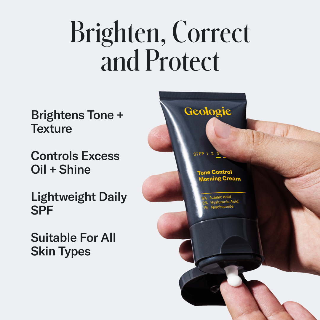 A hand squeezing Geologie's Tone Control Face Cream with SPF15 from a tube labeled Geologie with text promoting its benefits: brighten, correct, protect, and soothe with sensitive skin moisturizer.